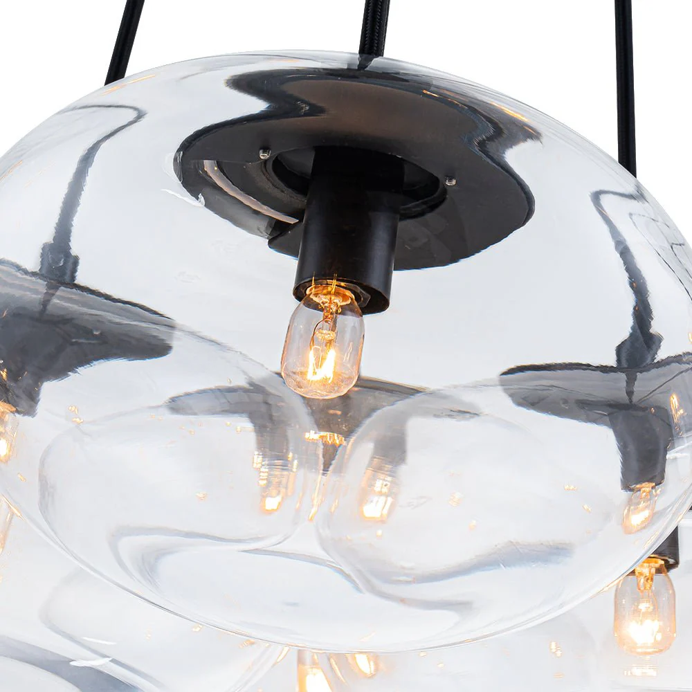 Black 7-Light Cluster Clear Glass Oval Globe Chandelier - Image 8